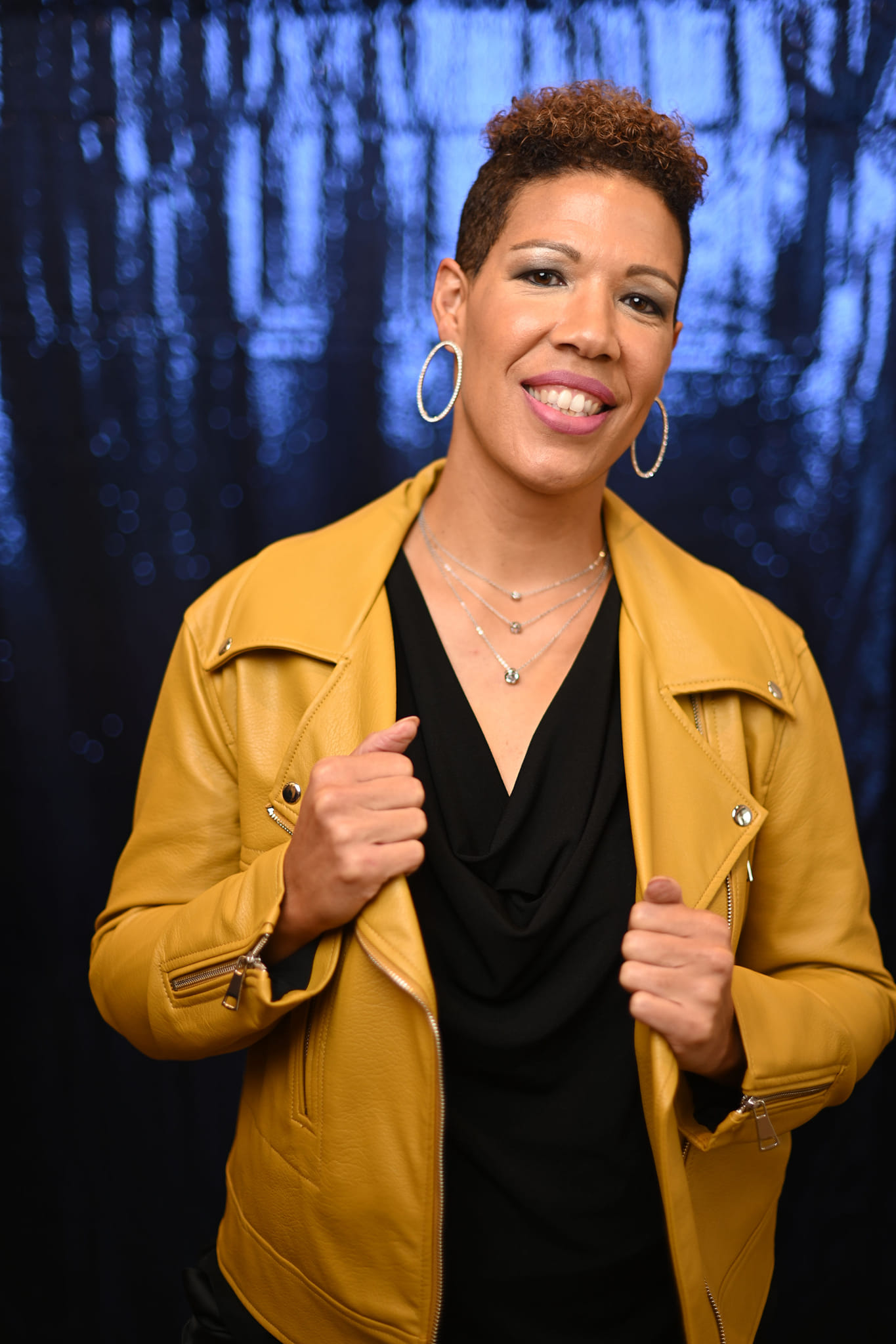 Tiffany Rose Quinones wearing a yellow jacket